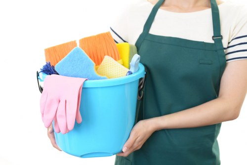 Cleaner wearing protective gear preparing supplies safely