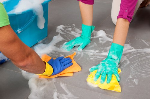 Cleaning professional preparing to start a booked service