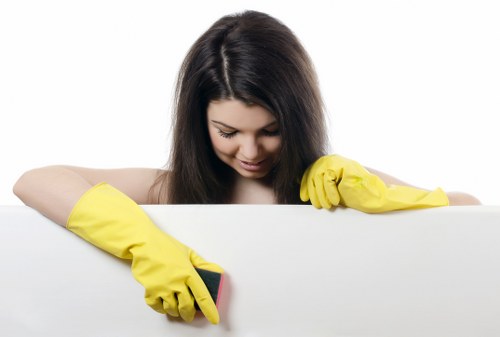 Local Hammersmith cleaner vacuuming a residential hallway